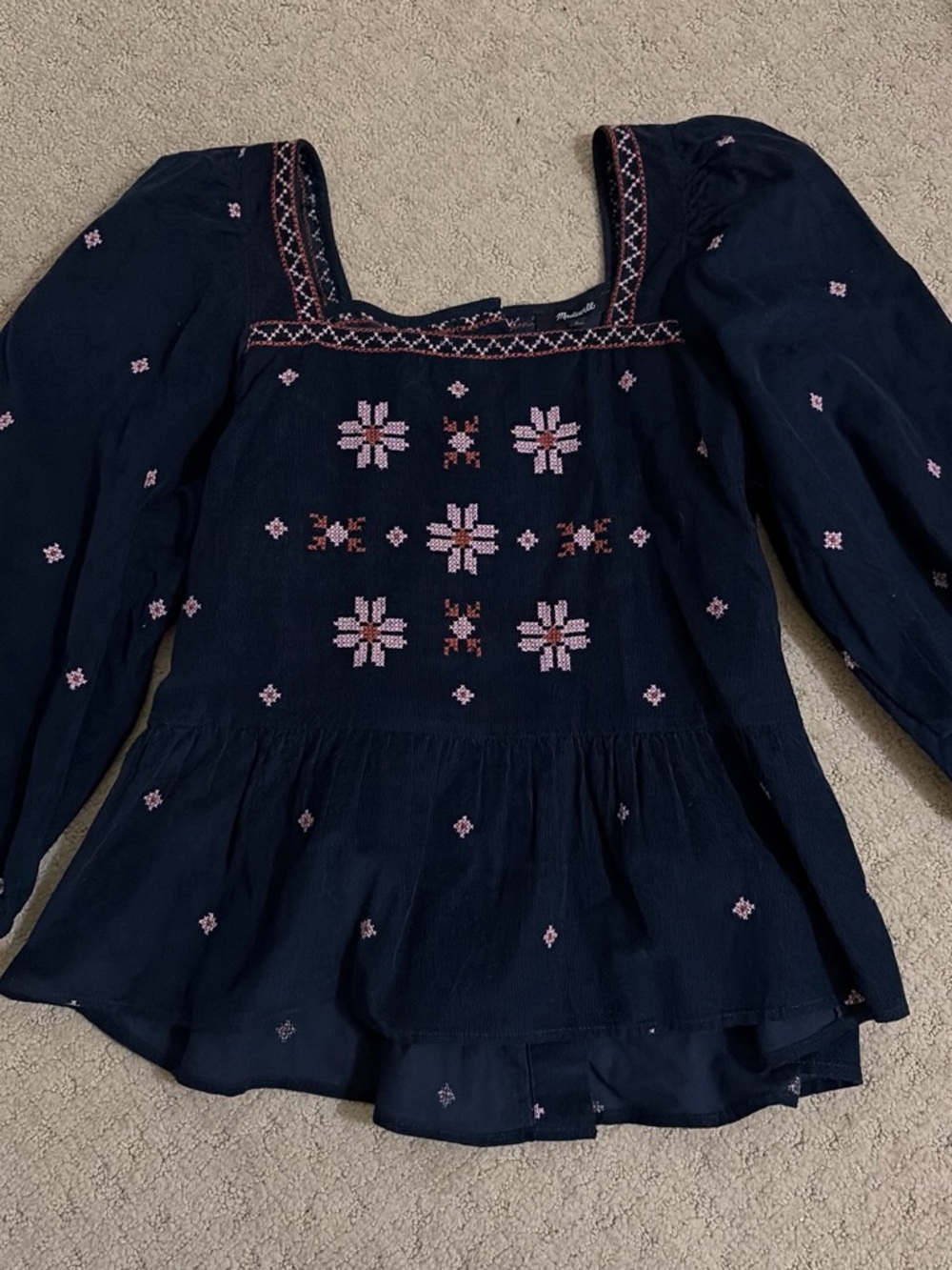 Madewell corduroy navy peplum button-back blouse with pink embroidery